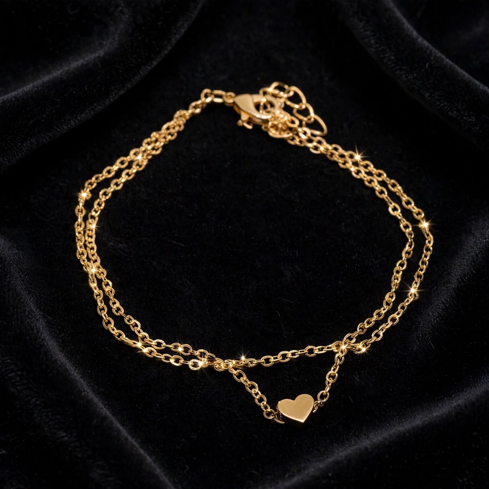 gold plated double chain heart anklet on black velvet - artificial payal