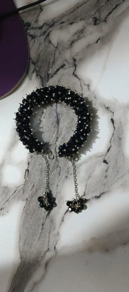 artificial black crystal gajra bracelet with silver beads and latkan tassels for women bridal wear